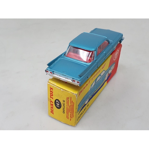 1345 - A boxed Dinky Toys No.147 metallic blue Cadillac 62 with red interior, M, box Ex