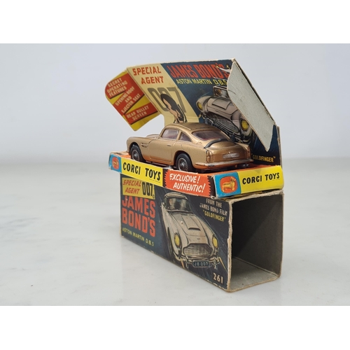 1359 - A boxed Corgi Toys No.261 James Bond 007 Aston Martin D.B.5, G, box G (missing end flap), complete w... 