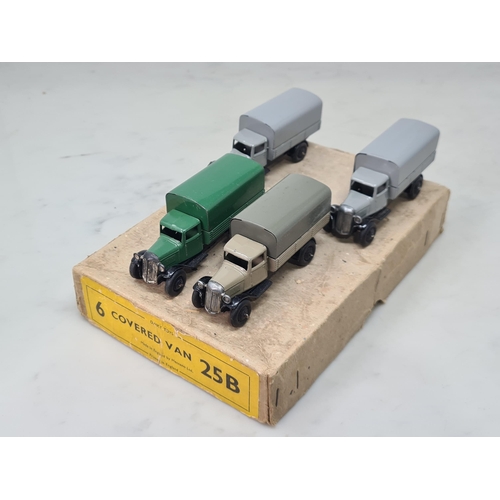 1393 - A Dinky Toys Trade Box 25B Covered Wagons containing two green and two grey models, Nr M-M, box VG w... 