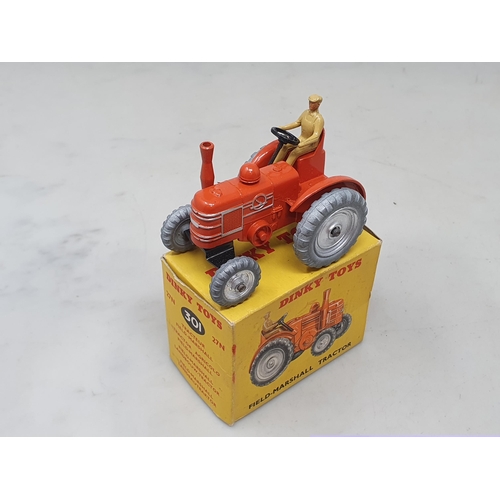 1412 - A boxed Dinky Toys No.301 Field Marshall Tractor, M, box Ex plus with packing