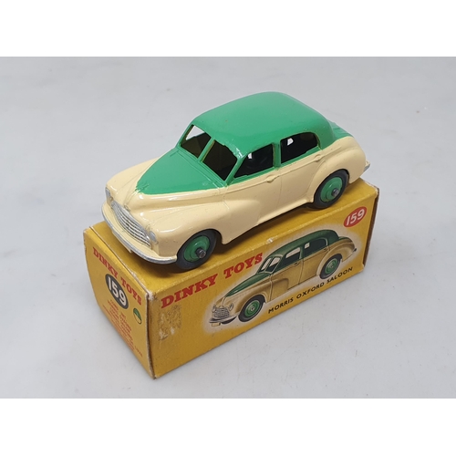 1419 - A boxed Dinky Toys No.159 green over cream Morris Oxford Saloon, M, box VG-Ex