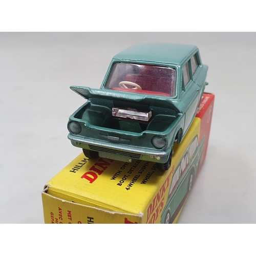 1426 - A boxed Dinky Toys No.138 metallic green Hillman Imp with red interior, Nr M-M, box Ex plus