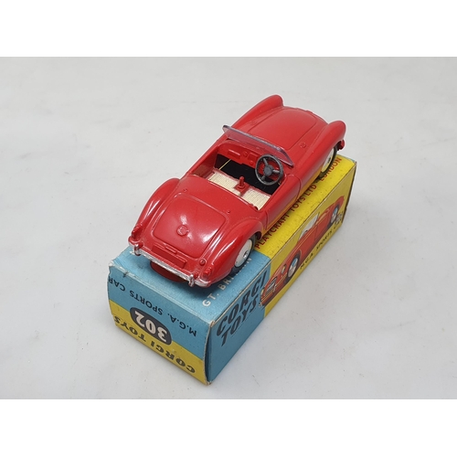 1478 - A boxed Corgi Toys No.302 red M.G.A. Sports Car, M, box Nr perfect