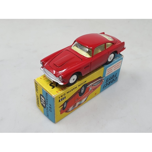 1485 - A boxed Corgi Toys No.218 red Aston Martin D.B.4, nR m-m, BOX eX