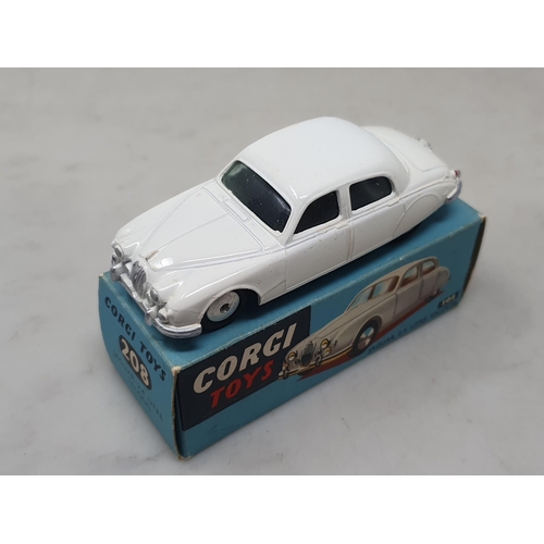 1493 - A boxed Corgi Toys No.208 white Jaguar 2.4l Saloon, Ex, box Ex plus