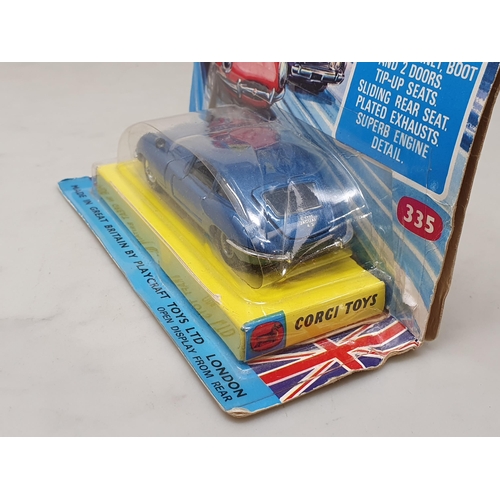 1494 - A boxed Corgi Toys No.335 blue Jaguar E-type in blister pack, Ex, box Ex plus