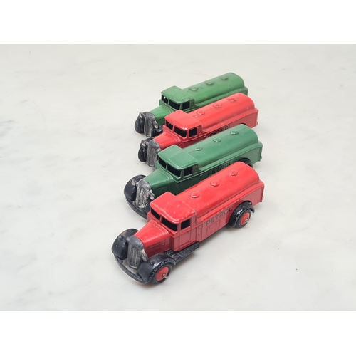 1518 - Four Dinky Toys 25d Petrol Lorries, two green and two red, generally G-Ex