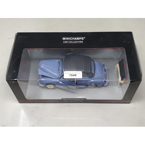 1549 - A boxed Minichamps 1:18 scale Morris Minor Cabriolet