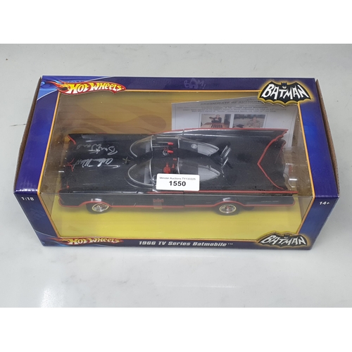 1550 - A boxed Hotwheels 1:18 scale signed Batman Batmobile with certificate of authenticity