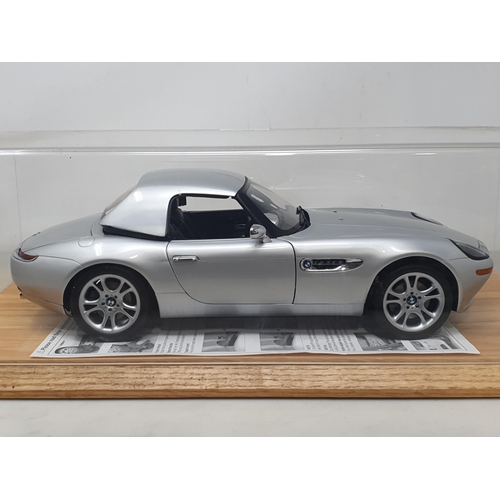 1552 - A Danbury Mint 1:12 scale limited edition James Bond 007 BMW Z8, with certificate of authenticity No... 