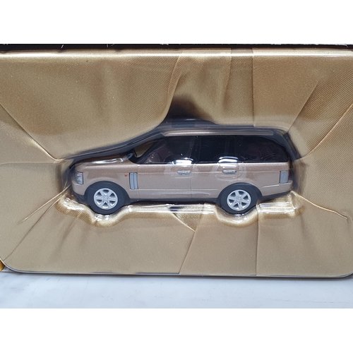 1553 - A boxed Britains Elite 00174 Land Rover Series 1 and a boxed Corgi limited edition 'White Gold' 2002... 