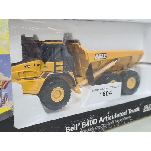 1604 - A boxed Norscot 1:50 scale Bell B40D Articulated Truck