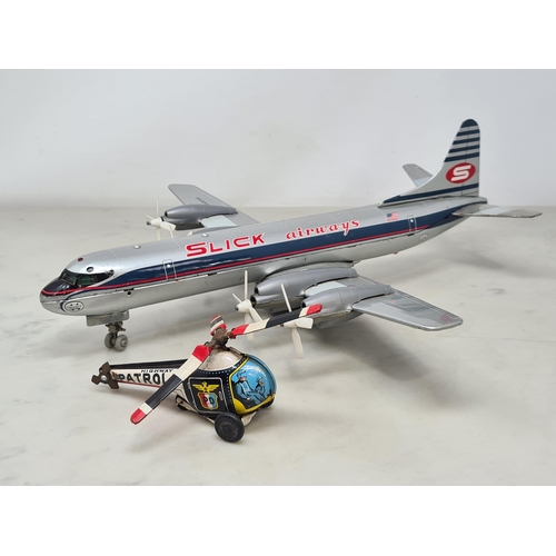 1620 - A Marx battery operated 'Slick Airways' Airliner and a Japanese tinplate Helicopter