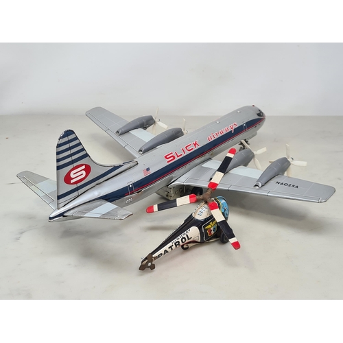 1620 - A Marx battery operated 'Slick Airways' Airliner and a Japanese tinplate Helicopter