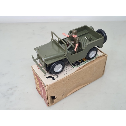 1626 - A boxed Marx battery operated Tricky Action Jeep, complete with figure, Ex, box G