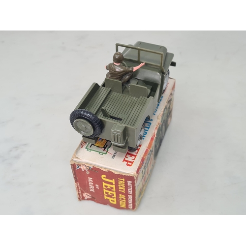 1626 - A boxed Marx battery operated Tricky Action Jeep, complete with figure, Ex, box G