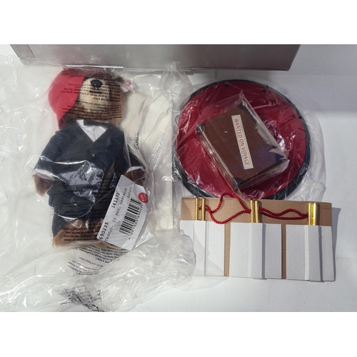 1644 - A boxed Steiff Limited Edition Paddington Bear with Luggage Case, Certificate and Stand, unopened in... 