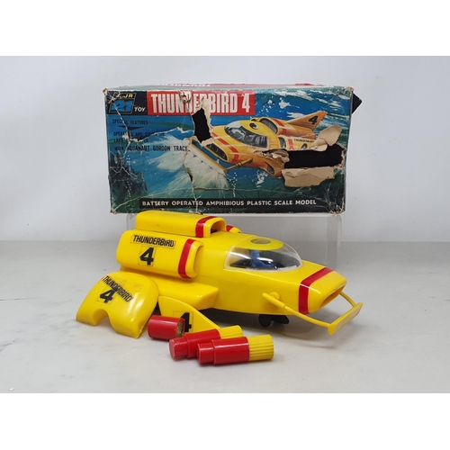 1624 - A boxed JR21 Toys Thunderbird 4 battery operated Vehicle, appears complete in VG condition box P