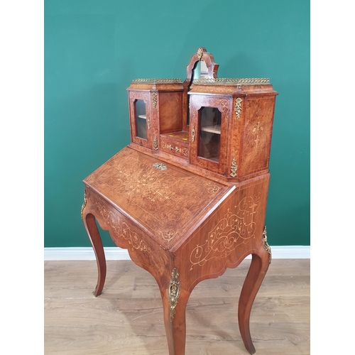 458 - A burr walnut and marquetry Bonheur-Du-Jour the raised back with shaped mirror flanked by pair of gl... 