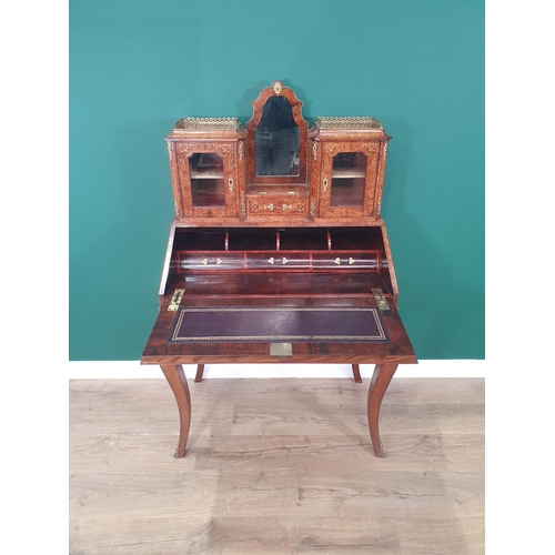 458 - A burr walnut and marquetry Bonheur-Du-Jour the raised back with shaped mirror flanked by pair of gl... 