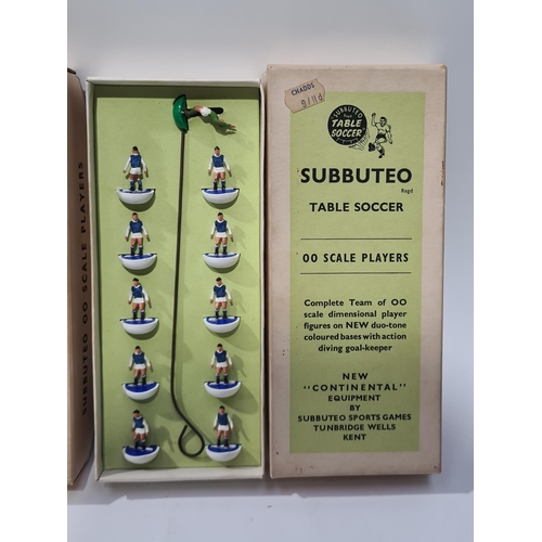 1630 - Three Subbuteo Table Soccer Teams including blue with white arms, blue and white stripes and orange