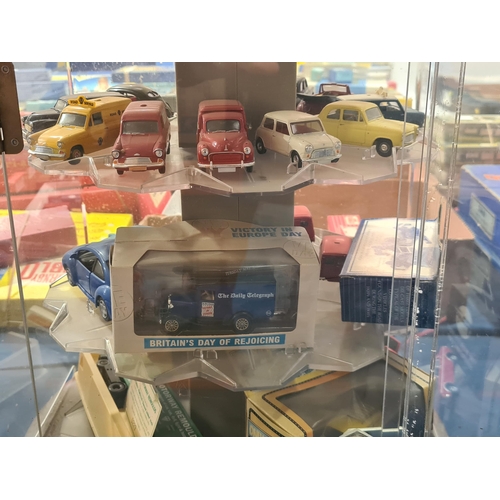 1632 - A Timex Perspex Display Cabinet containing a collection of Vanguard and other diecast Models 2ft 7in... 