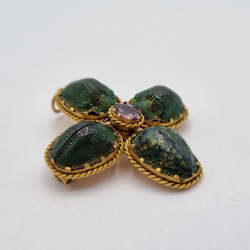 1 - A Victorian Scarab Beetle Pendant/Brooch quatrefoil design pendant/brooch with claw-set scarab beetl... 