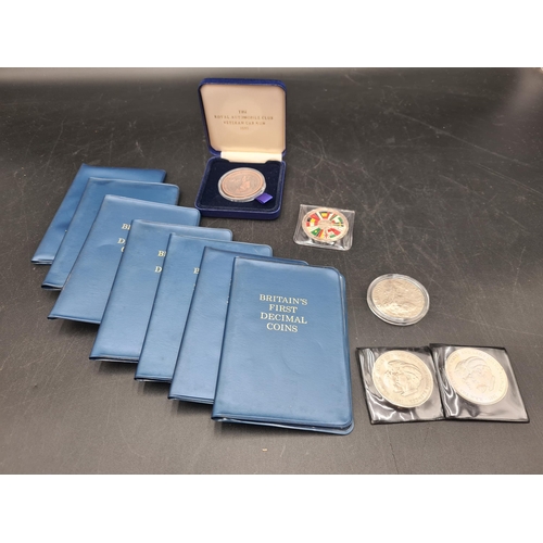 100 - A Continental silver Coin, worn, Seven Folders of Britain's First Decimal Coins, two Charles & Diana... 