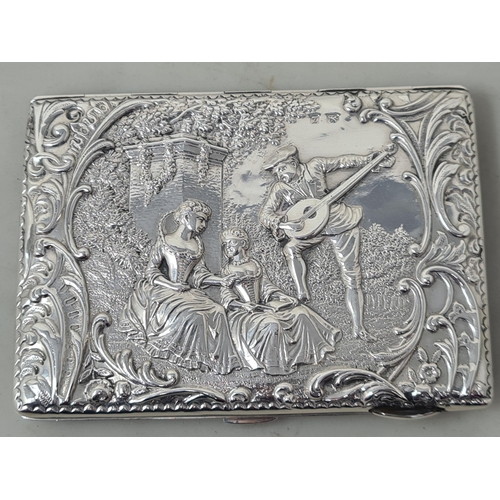 106 - A Victorian silver Card Case finely embossed and chased with formal garden scene within floral and s... 