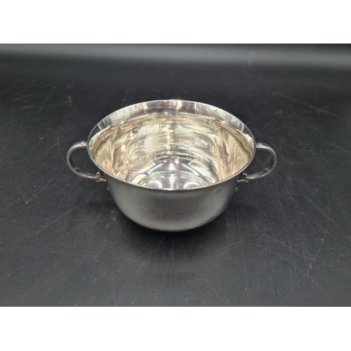 119 - A George V silver two handled circular Bowl, Sheffield 1912, 150gms