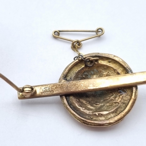 3 - A Bar Brooch set with lion mask, stamped 9ct gold, brooch 45mm wide, approx 12.5gms and a Victorian ... 