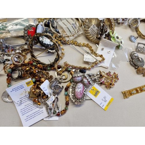 39 - A large collection of modern, vintage and earlier Costume Jewellery