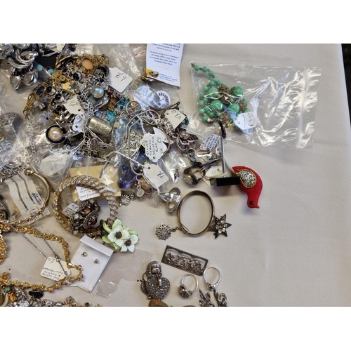 39 - A large collection of modern, vintage and earlier Costume Jewellery