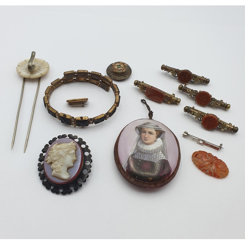 46 - A collection of antique Jewellery including a Cameo Brooch, four gold stone Nanny Pin/Brooches a Por... 