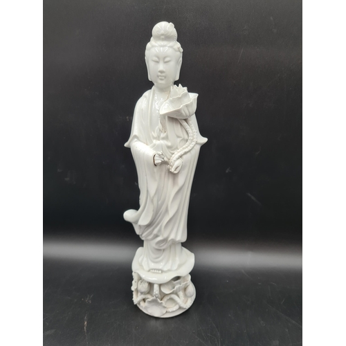 53 - A blanc de chine Figure of Quan Yin, 16in, and four Chinese polychrome Tea Bowls painted figures, bi... 