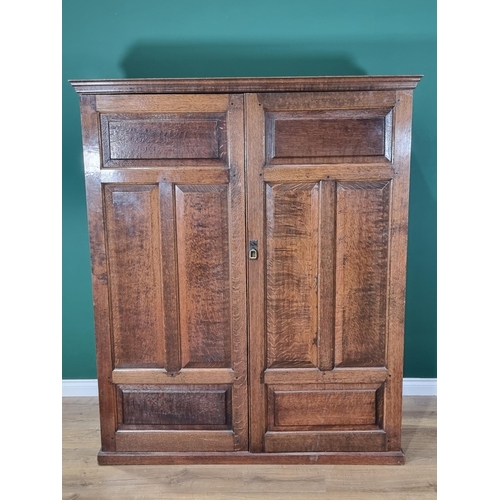 61 - An antique oak Cupboard fitted pair of fielded panel doors 5ft 10in H x 5ft W (R7)