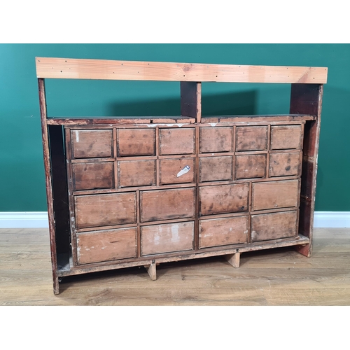 62 - A bank of twenty stained Apothecary Drawers with pigeon hole type top section, 3ft High x 4ft 1