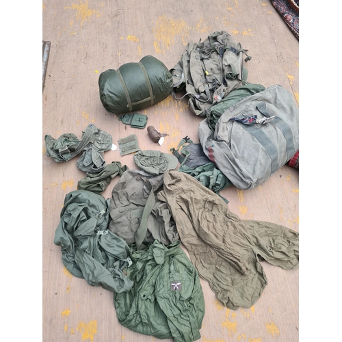 77 - A quantity of Military Bags, Satchels and various other items