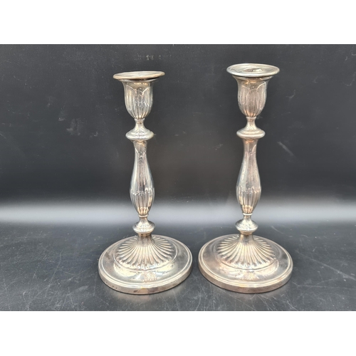 92 - A pair of George III silver Candlesticks with baluster columns, engraved initials on circular bases,... 