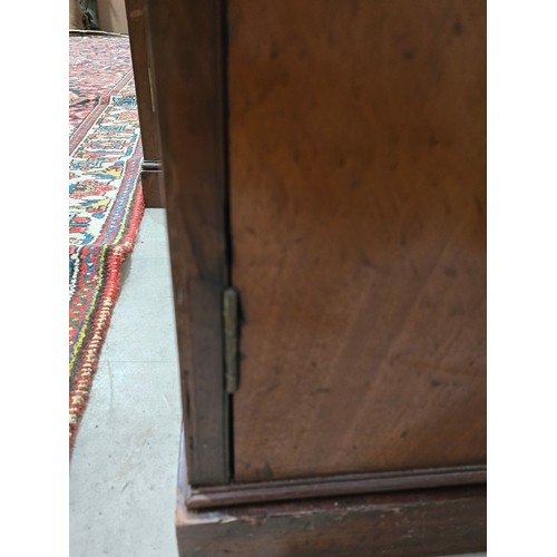 439 - A Regency mahogany and ebony inlaid Breakfront Library Bookcase, the moulded cornice above four lanc... 