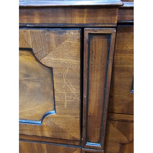 439 - A Regency mahogany and ebony inlaid Breakfront Library Bookcase, the moulded cornice above four lanc... 