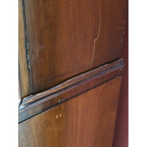 439 - A Regency mahogany and ebony inlaid Breakfront Library Bookcase, the moulded cornice above four lanc... 