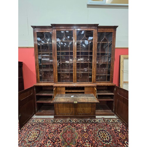 439 - A Regency mahogany and ebony inlaid Breakfront Library Bookcase, the moulded cornice above four lanc... 