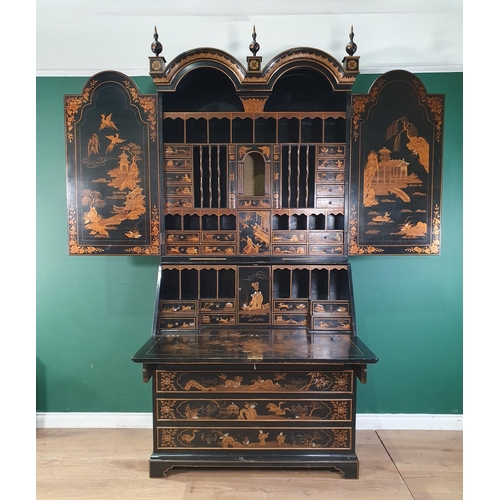 419 - A black lacquered and chinoiserie designed Bureau Bookcase having designs of figures and warriors in... 