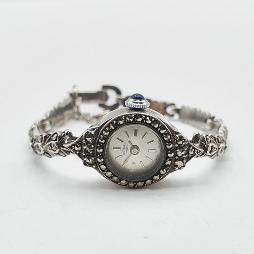 138 - A silver vintage lady's Rotary Cocktail Wristwatch, the silvered enamel dial having silver baton mar... 