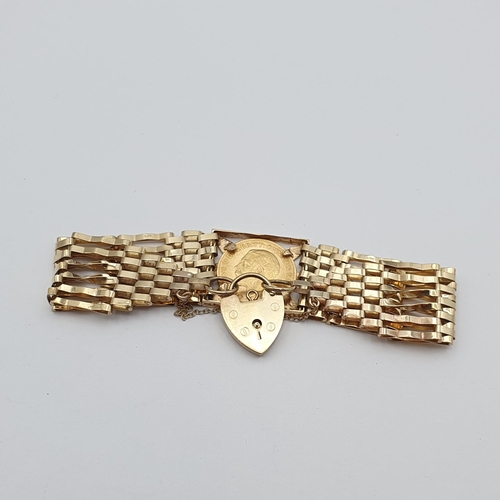 139 - A 9ct gold Gate-link Bracelet with heart padlock clasp set with a George V 1911 half sovereign, appr... 