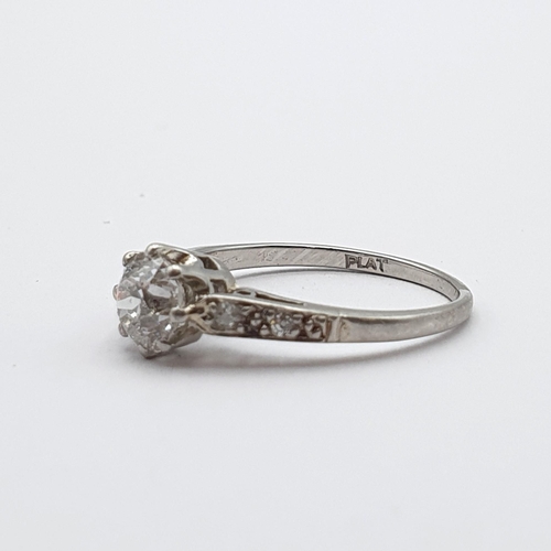 142 - A Diamond Ring, claw-set old-cut diamond in a rex collet with split tapered shoulders set small diam... 