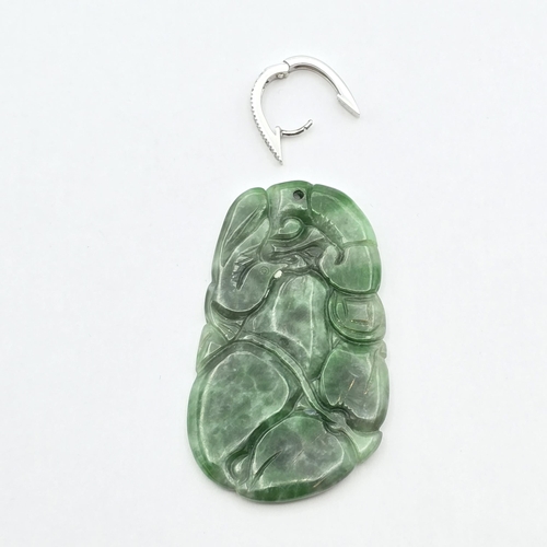 148 - A carved Jade Pendant with detachable white metal bail pavé-set two rows of single-cut diamonds stam... 