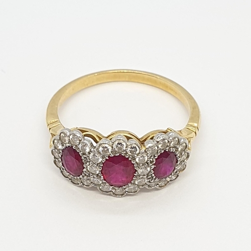 150 - A Ruby and Diamond Dress Ring, three oval mixed-cut rubies  surrounded by pavé-set single cut diamon... 