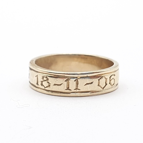 153 - A 9ct gold Ring with Celtic pattern scroll detail and engraved date, ring size P 1/2, approx 4.9gms